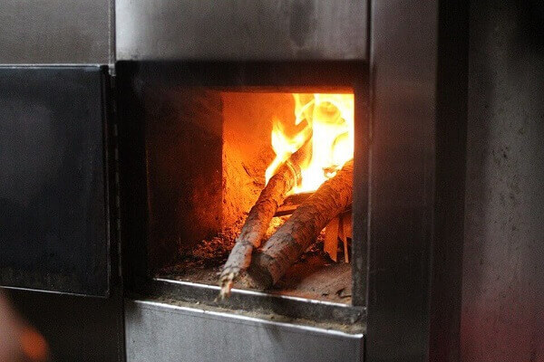 Woods burning inside a furnace