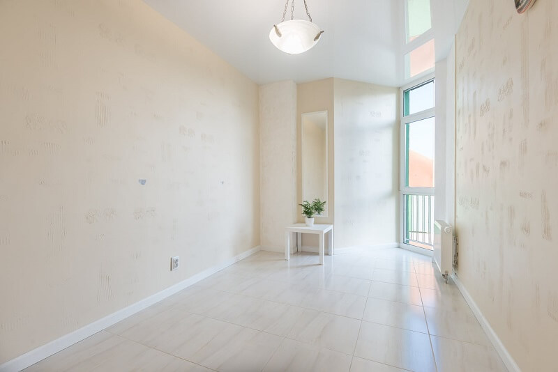 A brightly lit hallway of a house