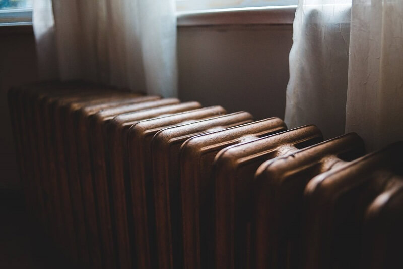 A close up image of a cast iron radiator in Cupertino, CA